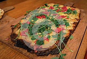 Alsatian Flammekueche or tarte flambee, a winstub restaurant, Strasbourg, France