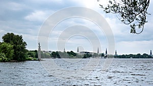 Alster Lake, Hamburg. Visible five towers in the city.
