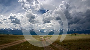 Altai landscape in summer with road and mountains, Russia