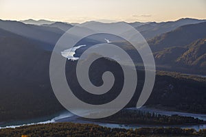 Altai Mountains, Katun River, View Of The Turquoise River Katun And Altai Mountains, Autumn Season. Mountain view at sunset