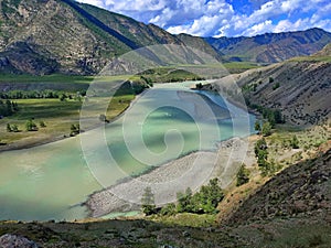 Altai Republic, Russia - 07.01.2022. The confluence of two rivers Chuya and Katun