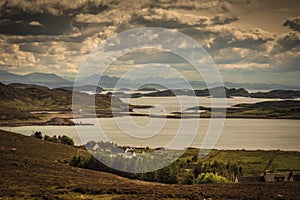 Altandhu hamlet on Atlantic Ocean inlet, Scotland.