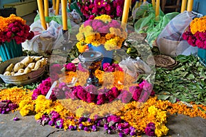 An altar for Day of the Dead Dia de Muertos celebrations, prehispanic altar,clay pot for burning incense photo