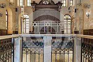Altar of historic Jewish Maimonides Synagogue or Rav Moshe Synagogue with wooden entrance at the far end, Cairo, Egypt photo