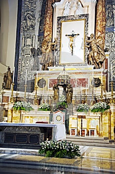 The altar of the main nave with a marble throne.