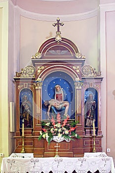 Altar of Our Lady of Sorrows in the church of St. Nicholas in Scitarjevo, Croatia photo