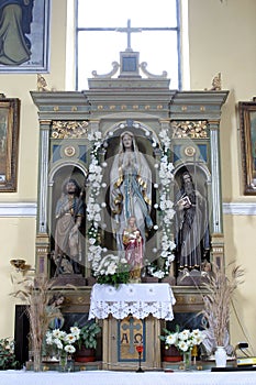 The altar of the Queen of the Holy Rosary in Church of Saint Joseph in Sisljavic, Croatia