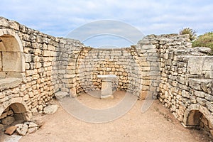 Altar in the ruins of ancient Greek city of Chersonesus Taurica in the Crimea peninsula under the cloudy sky, Sevastopol