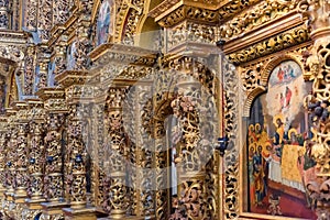 Wooden baroque iconostation inside old orthodox cathedral