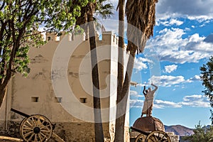 Alte Feste fortress with cannons, palms and independence monume