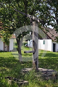 `Alte Geringen` - an historic wooden fountain in a lane fo old vine cellars