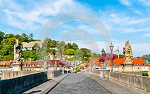 Alte Mainbrucke, the old bridge across the Main river in Wurzburg, Germany photo