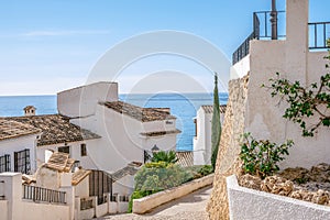 Altea old town with narrow streets and whitewashed houses. Architecture in small picturesque village of Altea near