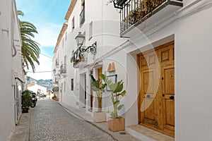 Altea old town with narrow streets and whitewashed houses. Architecture in small picturesque village of Altea near
