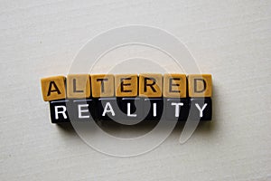 Altered Reality on wooden blocks. Business and inspiration concept photo
