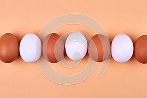 Alternation of white and brown eggs.