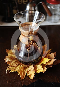 Alternational manual brewing coffee on yellow autumn leaves