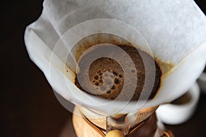 Alternative brewing of coffee in a paper filter closeup