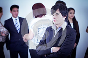 Alternative business man in front of a group