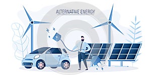 Alternative energy concept. Wind power generators and solar panels. Modern electric car, businessman holds charging cord