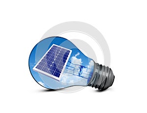 Alternative energy source. Light bulb with solar panel on background