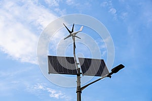 Alternative energy sources. Renewable photovoltaic technology with solar energy power panel and wind turbine. Sun energy