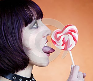 Alternative Girl with a Heart Lollipop