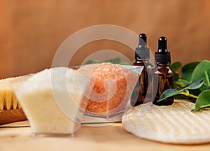 Alternative medicine.A bottle of natural organic cosmetics with oil, sea salt