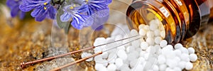 alternative medicine and care with herbal pills and acupuncture