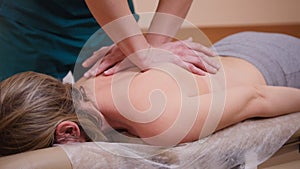 Alternative medicine - doctor osteopath have manual therapy for woman`s back