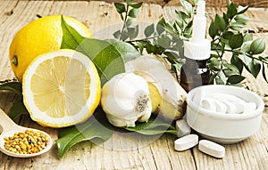 Alternative Medicine with Garlic, Ginger and Lemon Oil