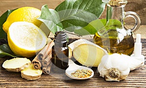 Alternative Medicine with Garlic, Ginger and Lemon Oil