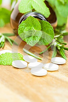 Alternative medicine with herbal and homeopathic pills