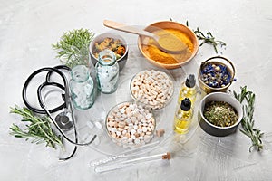 Alternative medicine herbs and homeopathic globules photo