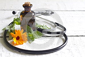 Alternative medicine herbs and stethoscope