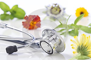 Alternative medicine herbs and stethoscope