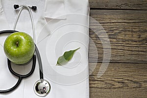 Alternative medicine stethoscope and green symbol background