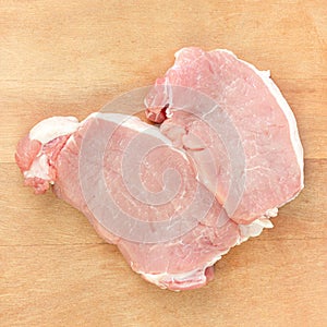 Alternative raw meat on kitchen cutting board, close up. Fillet steak beef meat