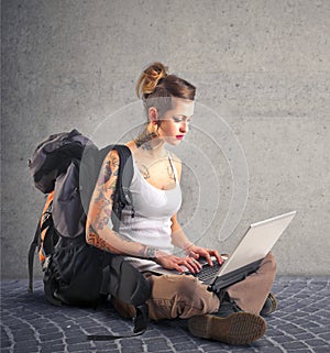 Alternative woman using her laptop