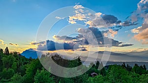 Altfinkenstein - Scenic sunset view of iconic mountain peak Dobratsch seen from Altfinkenstein at Baumgartnerhoehe