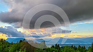 Altfinkenstein - Scenic sunset view of iconic mountain peak Dobratsch seen from Altfinkenstein at Baumgartnerhoehe