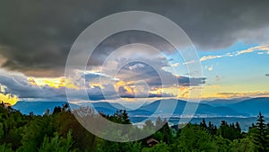 Altfinkenstein - Scenic sunset view of iconic mountain peak Dobratsch seen from Altfinkenstein at Baumgartnerhoehe