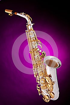 Alto Saxophone Isolated On Pink