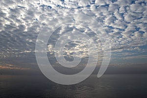 Altocumulus cloud over sea.