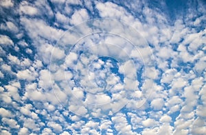 Altocumulus clouds on blue sky at sunny day. cloudscape. Beautiful sky weather forecast  background