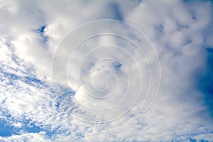 Altocumulus and altocumulus clouds in the sky