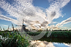 Altocumulus clouds over a windmill in Holland