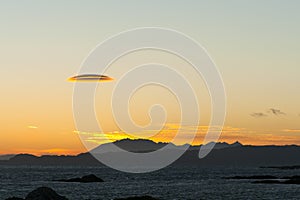 Altocumulus lenticularis cloud at sunset