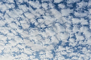 Altocumulus patch layered fluffy clouds photo