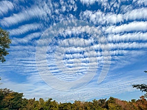 Altocumulus undulatus cloud over tropical forest in northern Thailand